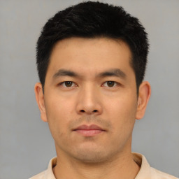 Neutral asian young-adult male with short  black hair and brown eyes