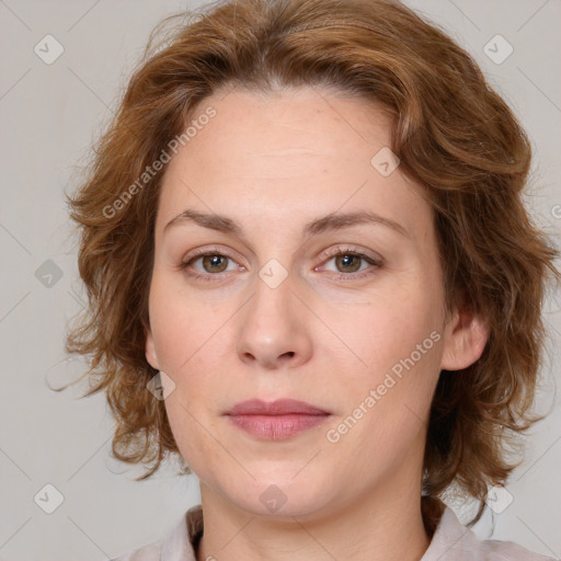 Joyful white young-adult female with medium  brown hair and green eyes