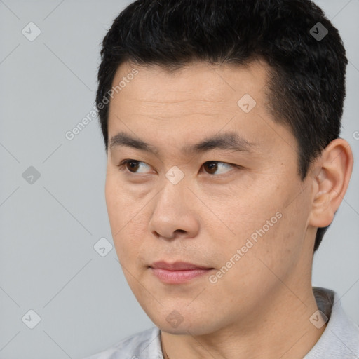 Neutral asian young-adult male with short  black hair and brown eyes