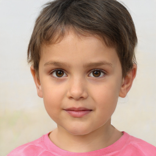 Joyful white child male with short  brown hair and brown eyes