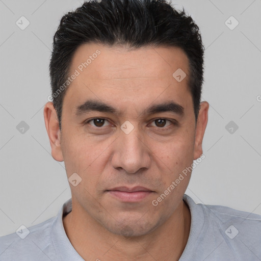 Joyful white young-adult male with short  black hair and brown eyes