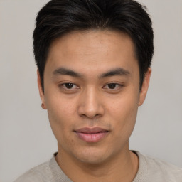 Neutral asian young-adult male with short  brown hair and brown eyes