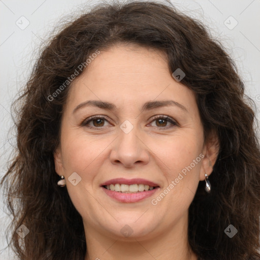 Joyful white adult female with long  brown hair and brown eyes