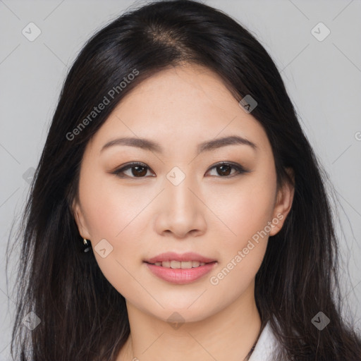 Joyful asian young-adult female with long  black hair and brown eyes