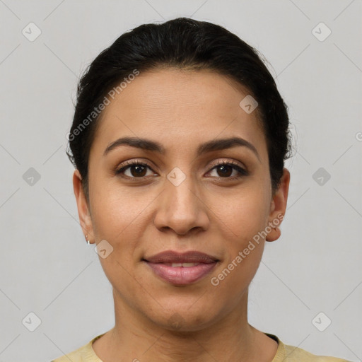 Joyful latino young-adult female with short  brown hair and brown eyes