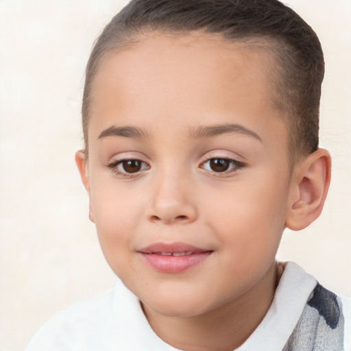 Joyful white child female with short  brown hair and brown eyes