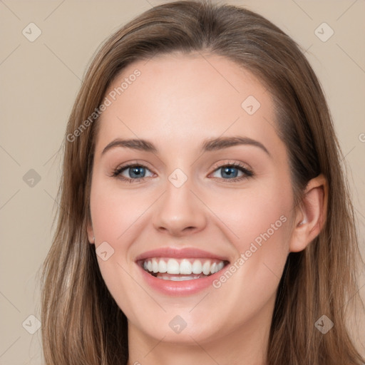 Joyful white young-adult female with long  brown hair and grey eyes