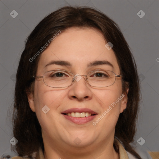 Joyful white adult female with medium  brown hair and brown eyes