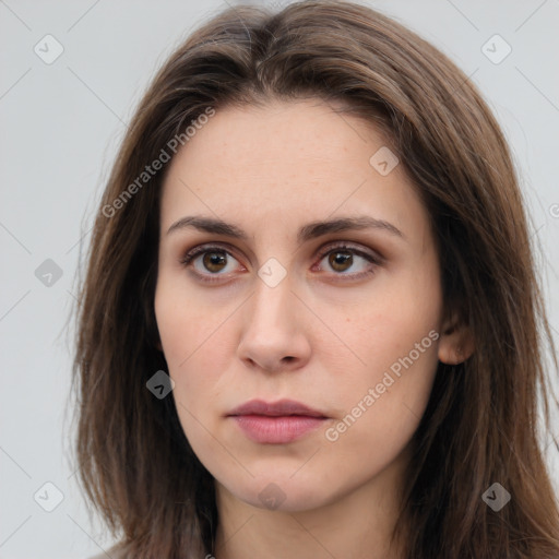 Neutral white young-adult female with long  brown hair and brown eyes