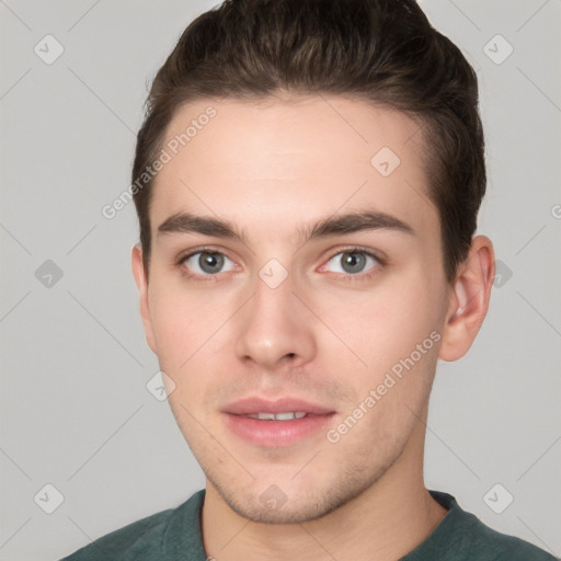 Neutral white young-adult male with short  brown hair and brown eyes