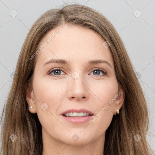 Joyful white young-adult female with long  brown hair and grey eyes