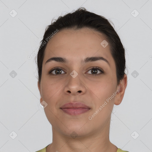 Joyful white young-adult female with short  brown hair and brown eyes