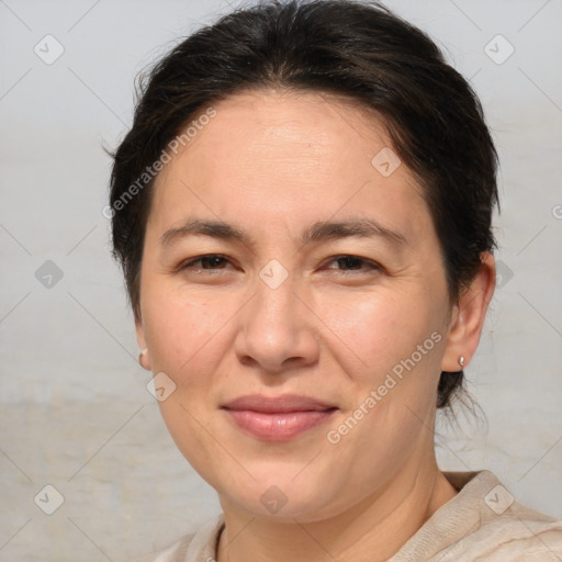 Joyful white adult female with medium  brown hair and brown eyes