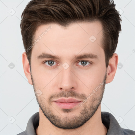 Neutral white young-adult male with short  brown hair and brown eyes