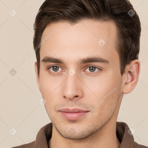 Neutral white young-adult male with short  brown hair and brown eyes