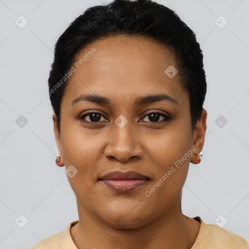 Joyful latino young-adult female with short  black hair and brown eyes