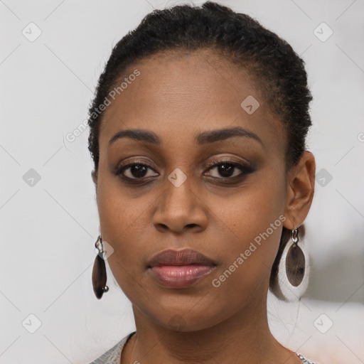 Neutral black young-adult female with short  brown hair and brown eyes