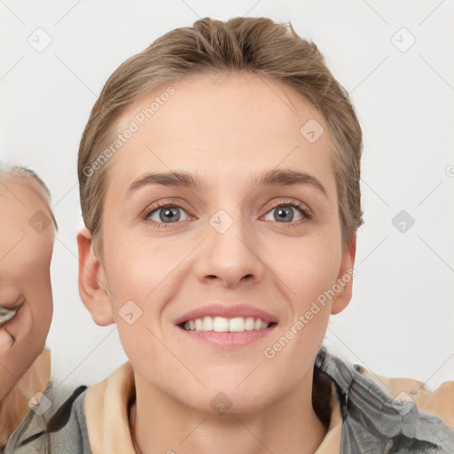 Joyful white young-adult female with short  brown hair and grey eyes