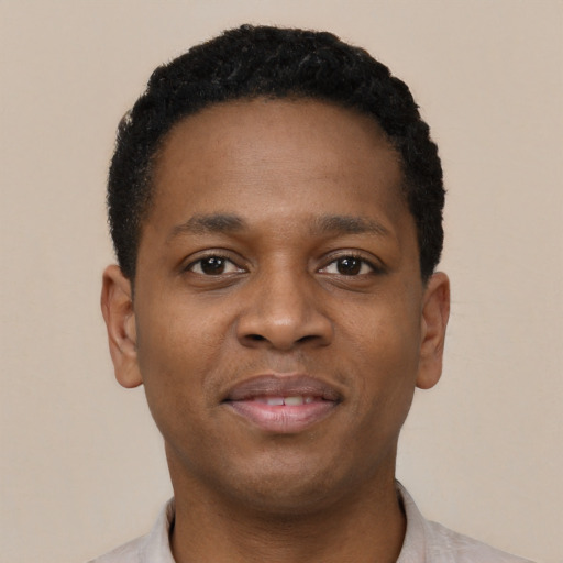 Neutral black young-adult male with short  black hair and brown eyes