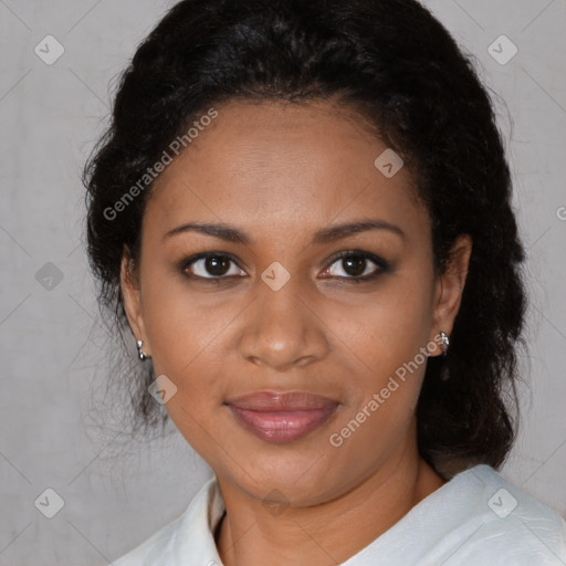 Joyful black adult female with medium  brown hair and brown eyes