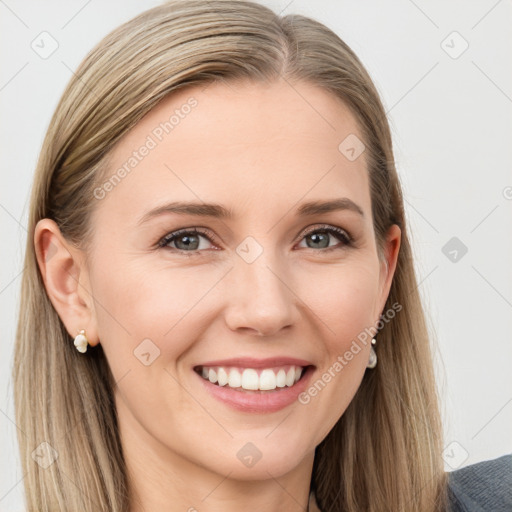 Joyful white young-adult female with long  brown hair and blue eyes