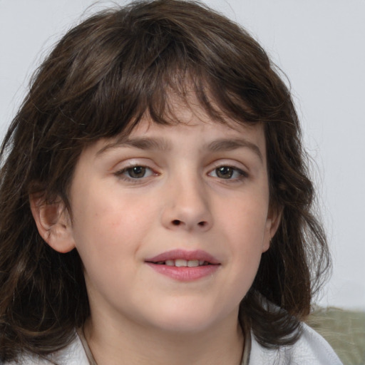 Joyful white child female with medium  brown hair and brown eyes