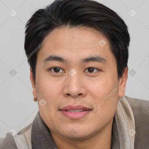 Joyful white young-adult male with short  brown hair and brown eyes