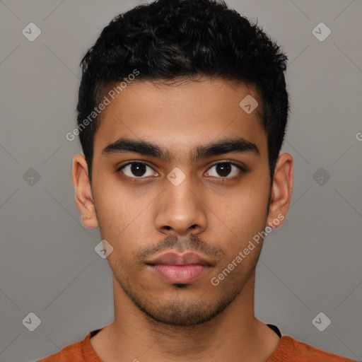 Neutral latino young-adult male with short  black hair and brown eyes