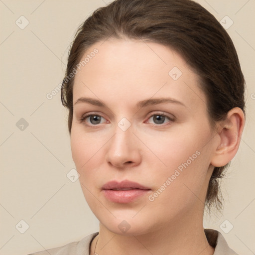 Neutral white young-adult female with medium  brown hair and grey eyes