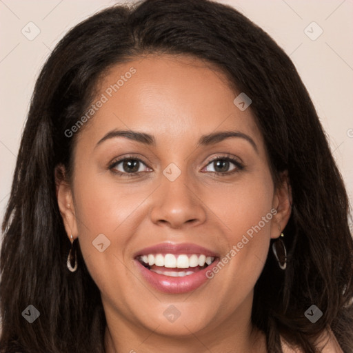 Joyful white young-adult female with long  brown hair and brown eyes