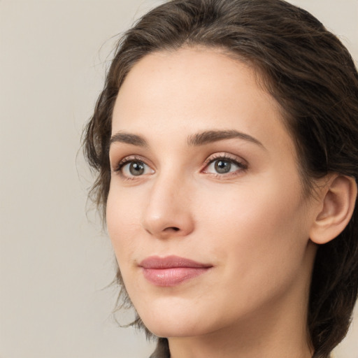 Neutral white young-adult female with medium  brown hair and brown eyes