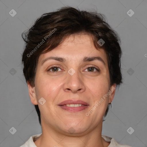 Joyful white adult female with short  brown hair and brown eyes