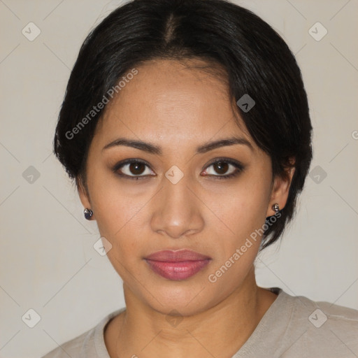 Joyful latino young-adult female with medium  brown hair and brown eyes