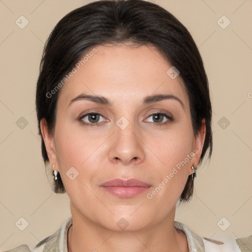 Joyful white adult female with medium  brown hair and brown eyes