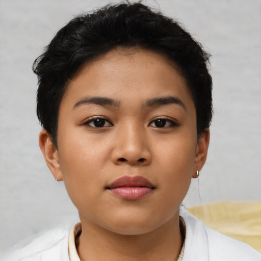 Neutral latino young-adult female with short  brown hair and brown eyes