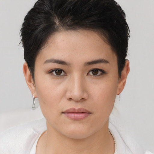 Neutral white young-adult female with short  brown hair and brown eyes