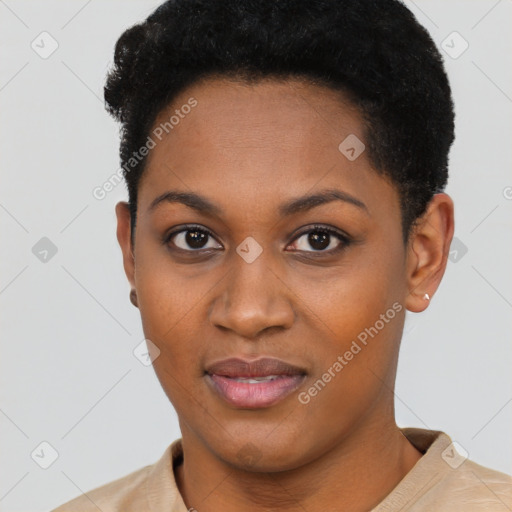 Joyful black young-adult female with short  black hair and brown eyes