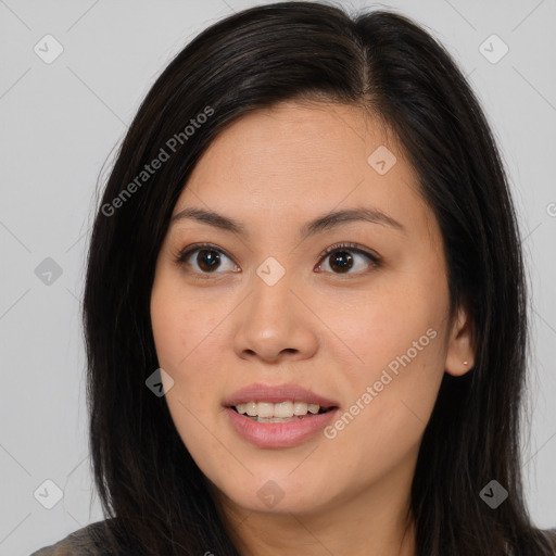 Joyful asian young-adult female with long  brown hair and brown eyes