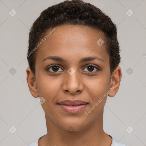 Joyful black young-adult female with short  brown hair and brown eyes