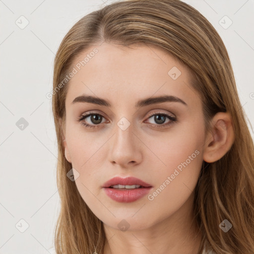 Neutral white young-adult female with long  brown hair and brown eyes