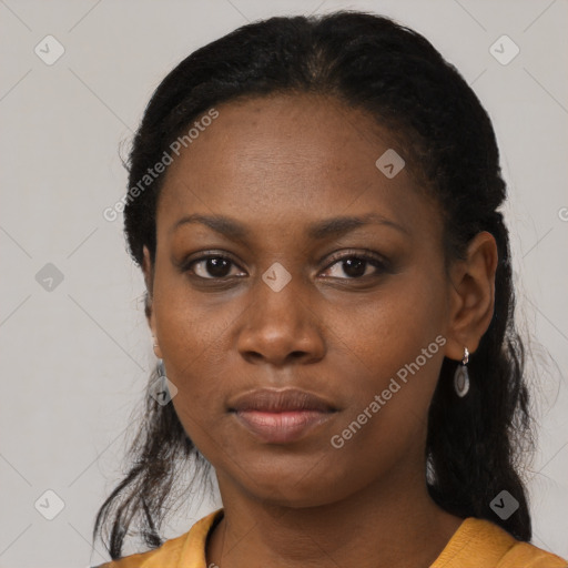 Neutral black young-adult female with medium  black hair and brown eyes