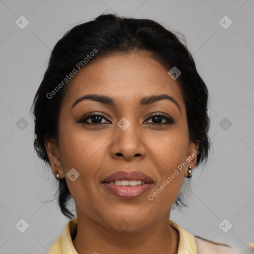 Joyful latino young-adult female with medium  brown hair and brown eyes