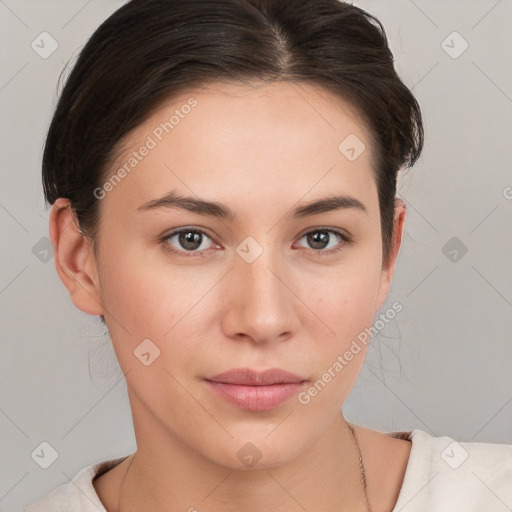 Neutral white young-adult female with short  brown hair and brown eyes