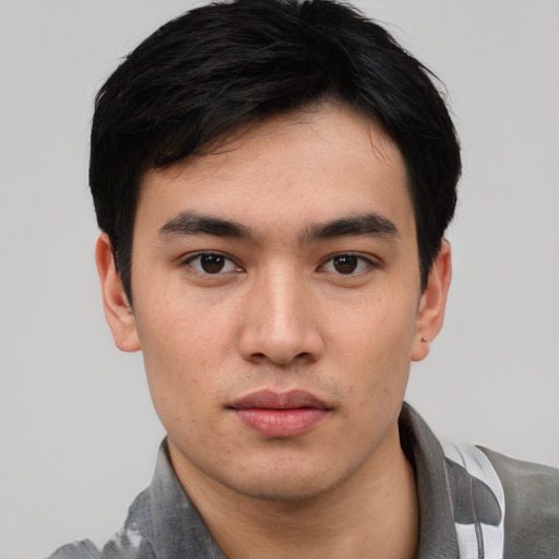 Neutral white young-adult male with short  black hair and brown eyes