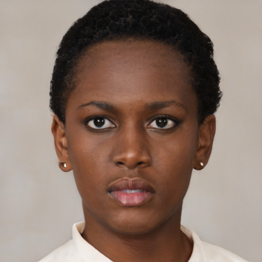 Neutral black young-adult female with short  black hair and brown eyes