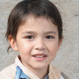 Joyful white child male with short  brown hair and brown eyes