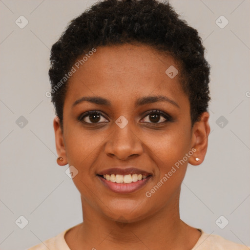 Joyful black young-adult female with short  brown hair and brown eyes