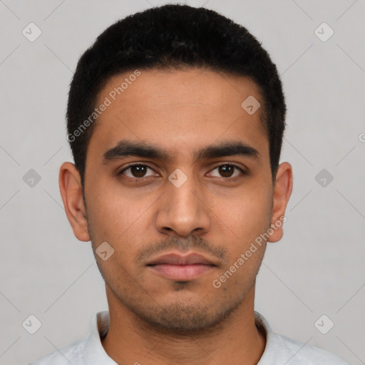 Neutral latino young-adult male with short  black hair and brown eyes