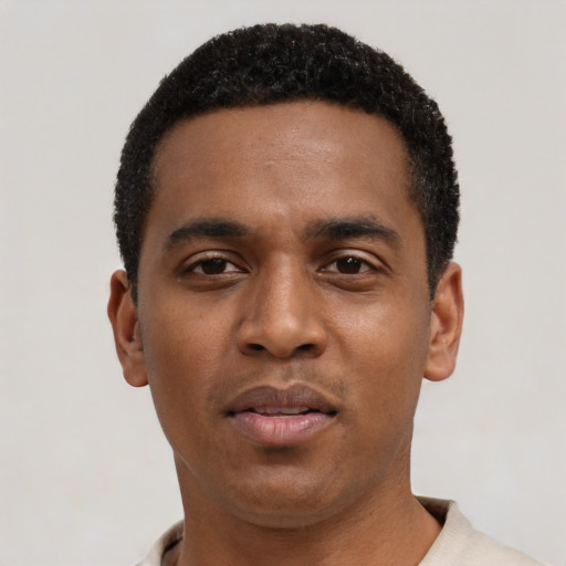 Neutral black young-adult male with short  black hair and brown eyes