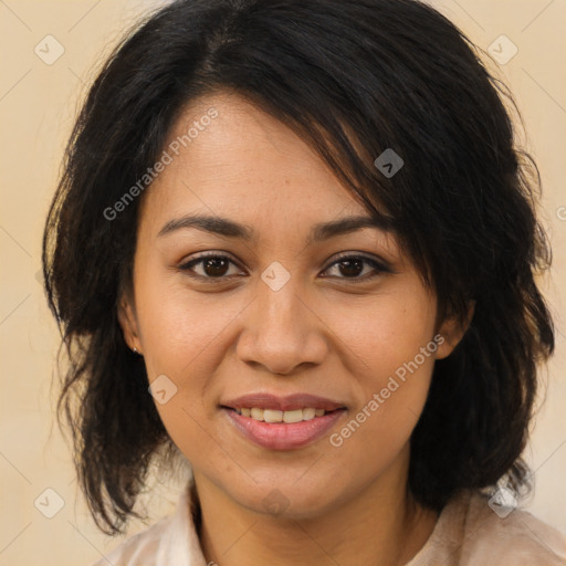 Joyful latino young-adult female with medium  brown hair and brown eyes